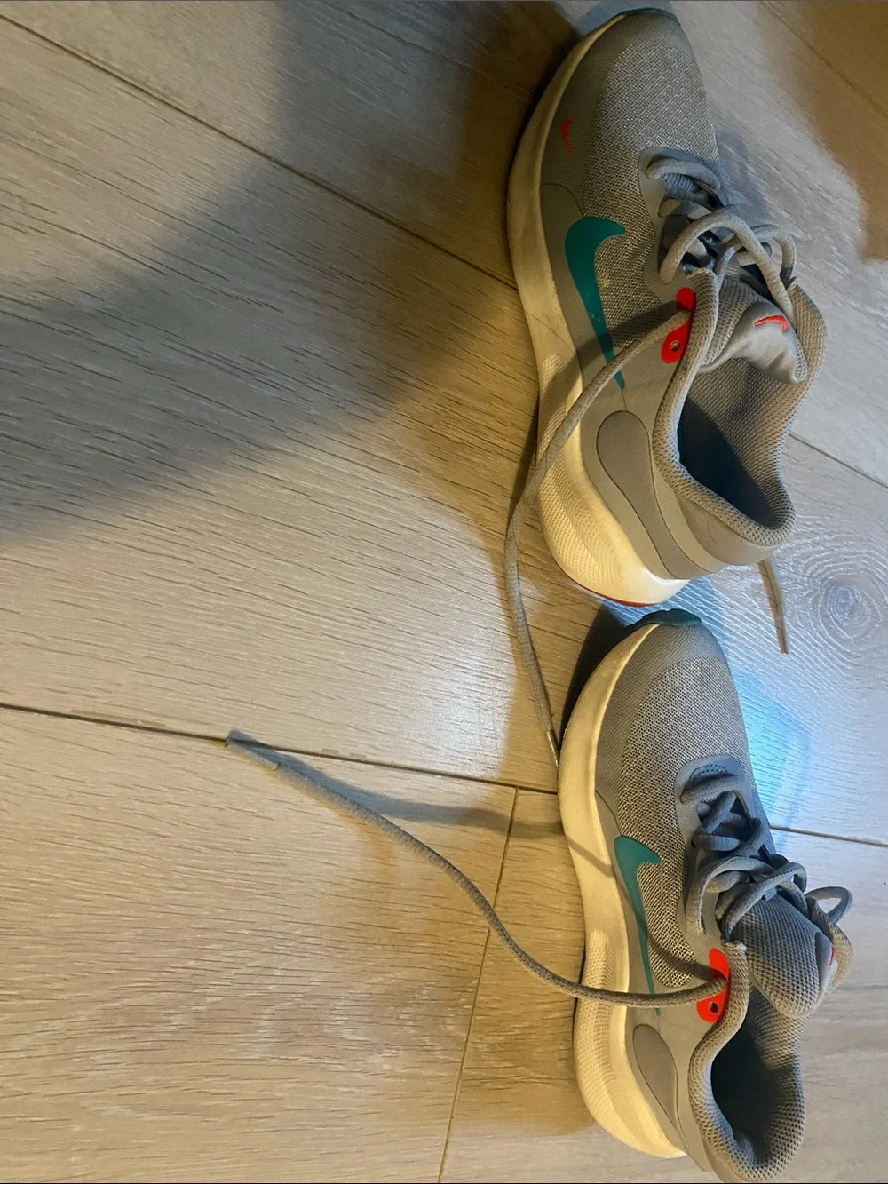 Nike Kids Gray Sneakers with Teal and Coral Accents